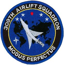 309th Airlift Squadron (FLAW)
The red dot near top center should be in a white 5-pointed star but the star is missing.  -GWO
