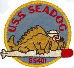 SS-401 USS Sea Dog
Namesake. The Dogfish, a small shark of the North Atlantic
Builder: Portsmouth Naval Shipyard, Kittery, ME
Laid down. 1 Nov 1943
Launched. 28 Mar 1944
Commissioned. 3 Jun 1944
Decommissioned. 27 Jun 1956
Stricken. 2 Dec 1968
Fate. Sold for scrap, 18 May 1973
Class and type. Balao class diesel-electric submarine
Displacement:	
1,526 long tons (1,550 t) surfaced
2,391 tons (2,429 t) submerged
Length. 	311 ft 6 in (94.95 m)
Beam. 27 ft 3 in (8.31 m)
Draft. 16 ft 10 in (5.13 m) maximum
Propulsion:	
4 × Fairbanks-Morse Model 38D8-⅛ 10-cylinder opposed piston diesel engines driving electrical generators
2 × 126-cell Sargo batteries
4 × high-speed Elliott electric motors with reduction gears
two propellers]
5,400 shp (4.0 MW) surfaced
2,740 shp (2.0 MW) submerged
Speed. 20.25 knots (38 km/h) surfaced; 8.75 knots (16 km/h) submerged
Range. 11,000 nautical miles (20,000 km) surfaced at 10 kn (19 km/h)
Endurance. 48 hours at 2 knots (3.7 km/h) submerged; 75 days on patrol
Test depth. 400 ft (120 m)
Complement. 10 officers, 70–71 enlisted
Armament:	
10 × 21-inch (533 mm) torpedo tubes
6 forward, 4 aft
24 torpedoes
1 × 5-inch (127 mm) / 25 caliber deck gun
Bofors 40 mm and Oerlikon 20 mm cannon


