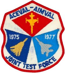 Air Combat Evaluation - Air Interception Missile Evaluation Joint Test Force
Air Combat Evaluation (ACEVAL) and Air Intercept Missile Evaluation (AIMVAL) were two back-to-back Joint Test & Evaluations which ran from 1974-78 at Nellis AFB.  The USAF component was provided by the 57 TFW at Nellis; it flew the RED FORCE aircraft (F-5E simulating the MIG-21) and one of the BLUE FORCE aircraft (F-15A Eagle, bottom right on patch).  The US Navy flew the other BLUE FORCE aircraft (F-14A Tomcat, bottom left on patch).  Most of the tests were conducted in an 18-mo. period during 1976-77.
