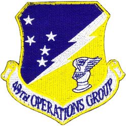 49th Operations Group
Established as 49 Pursuit Group (Interceptor) on 20 Nov 1940. Activated on 15 Jan 1941. Redesignated: 49 Fighter Group on 15 May 1942; 49 Fighter Group, Single Engine, on 20 Aug 1943; 49 Fighter Group on 6 Nov 1944; 49 Fighter-Bomber Group on 1 Feb 1950. Inactivated on 10 Dec 1957. Redesignated as: 49 Tactical Fighter Group on 31 Jul 1985; 49 Operations Group on 1 Nov 1991. Activated on 15 Nov 1991.
