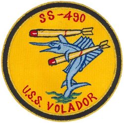 SS-490 USS Volador 
Namesake. The Volador, or California flying fish (Cheilopogon pinnatibarbatus californicus)
Builder. Portsmouth Naval Shipyard, Kittery, ME
Laid down. 15 Jun 1945
Launched. 21 May 1948
Commissioned. 1 Oct 1948
Decommissioned. 18 Aug 1972
Stricken	. 5 Dec 1977
Fate. Transferred to Italy, 18 Aug 1972; sold to Italy 5 Dec 1977

General characteristics (Completed as GUPPY II)
Class and type. Tench-class diesel-electric submarine
Displacement:	
1,870 tons (1,900 t) surfaced
2,440 tons (2,480 t) submerged
Length. 307 ft (94 m)
Beam. 27 ft 4 in (8.33 m)
Draft. 17 ft (5.2 m)
Propulsion:	
4 × Fairbanks-Morse Model 38D8-⅛ 10-cylinder opposed piston diesel engines, equipped with a snorkel, driving electrical generators
1 × 184 cell, 1 × 68 cell, and 2 × 126 cell GUPPY-type batteries (total 504 cells)
2 × low-speed direct-drive Elliott electric motors
two propellers
Speed. 18.0 knots (33.3 km/h) maximum, 13.5 knots (25.0 km/h) cruising (Surfaced): 16.0 knots (29.6 km/h) for ½ hour, 9.0 knots (16.7 km/h) snorkeling, 3.5 knots (6.5 km/h) cruising (Submerged)
Range. 15,000 nm (28,000 km) surfaced at 11 knots (20 km/h)
Endurance. 48 hours at 4 knots (7 km/h) submerged
Test depth. 400 ft (120 m)
Complement. 9–10 officers, 5 Chief Petty Officers, 70 enlisted men
Sensors and processing systems:	
WFA active sonar
JT passive sonar
Mk 106 torpedo fire control system
Armament:	
10 × 21-inch (533 mm) torpedo tubes  (six forward, four aft)

General characteristics (Guppy III)
Displacement:	
1,975 tons (2,007 t) surfaced
2,450 tons (2,489 t) submerged
Length. 	321 ft (97.8 m)
Beam. 27 ft 4 in (7.4 m)
Draft. 17 ft (5.2 m)
Speed. 17.2 knots (31.9 km/h) maximum, 12.2 knots (22.6 km/h) cruising (Surfaced); 14.5 knots (26.9 km/h) for ½ hour, 6.2 knots (11.5 km/h) snorkeling, 3.7 knots (6.9 km/h) cruising (Submerged)
Range. 15,900 nm (29,400 km) surfaced at 8.5 knots (16 km/h)
Endurance. 36 hours at 3 knots (6 km/h) submerged
Complement. 8–10 officers, 5 petty officers, 70–80 enlisted men
Sensors and processing systems:
BQS-4 active search sonar
BQR-2B passive search sonar
BQG-4 passive attack sonar

