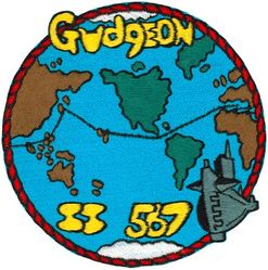 SS-567 USS Gudgeon WORLD CRUISE 1957
Namesake. The gudgeon, a species of small fresh-water minnow
Builder. Portsmouth Naval Shipyard, NH
Laid down. 20 May 1950
Launched. 11 Jun 1952
Commissioned. 	21 Nov 1952
Decommissioned. 30 Sep 1983
Stricken. 6 Aug 1987
Fate. Leased to Turkey, 1983; Sold to Turkey, 1987
Class and type. Tang-class submarine Attack submarine
Displacement:
1,560 long tons (1,585 t)
Length. 269 ft 2 in (82.04 m)
Beam. 27 ft 2 in (8.28 m)
Draft. 17 ft (5.2 m)
Speed. 15.5 knots (17.8 mph; 28.7 km/h)
Test depth. 250 m (820 ft)
Complement. 83 officers and men
Armament. 8 × 21 inch (533 mm) torpedo tubes (6 forward, 2 aft)

