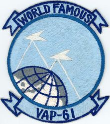 Heavy Photographic Squadron 61 (VAP-61) 
Established as Patrol Squadron SIXTY ONE (VP-61) on 20 Jan 1951. Redesignated: Photographic Squadron SIXTY ONE (VJ-61) on 5 Mar 1952; Heavy Photographic Squadron SIXTY ONE (VAP-61) "World Recorders" in Apr 1956. Composite Photographic Reconnaissance Squadron SIXTY ONE (VCP-61) on 1 Jul 1959. Heavy Photographic Squadron SIXTY ONE (VAP-61) on 1 Jul 1961. Disestablished on 1 Jul 1971.

North American AJ-2P Savage, 1952
Vought F8U-1P Crusader, 1959-1961
Douglas A3D-2P/RA-3B/KA-3B Skywarrior, 1959-1971

Insignia (2nd insignia) approved on 11 Jan 1961


