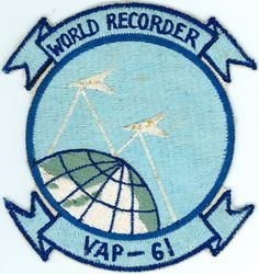 Heavy Photographic Squadron 61 (VAP-61) 
Established as Patrol Squadron SIXTY ONE (VP-61) on 20 Jan 1951. Redesignated: Photographic Squadron SIXTY ONE (VJ-61) on 5 Mar 1952; Heavy Photographic Squadron SIXTY ONE (VAP-61) "World Recorders" in Apr 1956. Composite Photographic Reconnaissance Squadron SIXTY ONE (VCP-61) on 1 Jul 1959. Heavy Photographic Squadron SIXTY ONE (VAP-61) on 1 Jul 1961. Disestablished on 1 Jul 1971.

North American AJ-2P Savage, 1952
Vought F8U-1P Crusader, 1959-1961
Douglas A3D-2P/RA-3B/KA-3B Skywarrior, 1959-1971

Insignia (2nd insignia) approved on 11 Jan 1961

