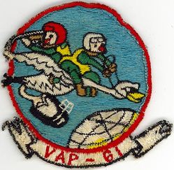 Heavy Photographic Squadron 61 (VAP-61) 
Established as Patrol Squadron SIXTY ONE (VP-61) on 20 Jan 1951. Redesignated: Photographic Squadron SIXTY ONE (VJ-61) on 5 Mar 1952; Heavy Photographic Squadron SIXTY ONE (VAP-61) "World Recorders" in Apr 1956. Composite Photographic Reconnaissance Squadron SIXTY ONE (VCP-61) on 1 Jul 1959. Heavy Photographic Squadron SIXTY ONE (VAP-61) on 1 Jul 1961. Disestablished on 1 Jul 1971.

North American AJ-2P Savage, 1952
Vought F8U-1P Crusader, 1959-1961
Douglas A3D-2P/RA-3B/KA-3B Skywarrior, 1959-1971

Insignia (2nd insignia) approved on 11 Jan 1961


