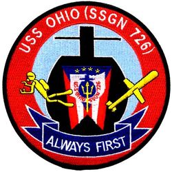 SSGN-726 USS Ohio 
Namesake. State of Ohio
Ordered. 1 Jul 1974
Builder.	General Dynamics Electric Boat
Laid down. 10 Apr 1976
Launched. 7 Apr 1979
Commissioned.	11 Nov 1981
Homeport. Bangor, WA
Motto. Always first
Nickname. First and Finest!
Status. in active service
Class and type. Ohio class ballistic missile submarine
Displacement:	
16,764 metric tons (16,499 long tons) surfaced
18,750 metric tons (18,450 long tons) submerged
Length. 560 ft (170 m)
Beam. 42 ft (13 m)
Propulsion:	
1 × S8G PWR nuclear reactor[3] (HEU 93.5%)
2 × geared turbines
1 × 325 hp (242 kW) auxiliary motor
1 × shaft @ 60,000 shp (45,000 kW)
Speed:	
12 knots (14 mph; 22 km/h) surfaced
+20 knots (23 mph; 37 km/h) submerged (official)
25 knots (29 mph; 46 km/h) submerged (reported)
Range. unlimited
Endurance. approximately 60 days with food supplies
Test depth. +800 ft (240 m)
Crew. 15 officers, 140 enlisted
Sensors and processing systems: BQQ-6 Bow mounted sonar; BQR-19 Navigation; BQS-13 Active sonar; TB-16 towed array
Armament: 4 × 21 inch (533 mm) bow torpedo tubes.
As SSBN:
24 × Trident II C4 SLBM, each with up to 8 MIRVed W76 nuclear warheads
SSGN conversion:
22 tubes, each with 7 Tomahawk cruise missiles

