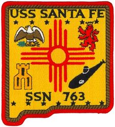 SSN-763 USS Santa Fe 
Namesake. The City of Santa Fe, New Mexico
Awarded. 21 Mar 1986
Builder. General Dynamics Electric Boat
Laid down. 9 Jul 1991
Launched. 12 Dec 1992
Sponsored by. Joy Johnson
Commissioned. 	8 Jan 1994
Class and type. Los Angeles-class submarine
Displacement:	
6,000 long tons (6,096 t) light
6,927 long tons (7,038 t) full
927 long tons (942 t) dead
Length. 110.3 m (361 ft 11 in)
Beam. 10 m (32 ft 10 in)
Draft. 9.4 m (30 ft 10 in)
Propulsion:	
1 × S6G PWR nuclear reactor with D2W core (165 MW), HEU 93.5%[1][2]
2 × steam turbines (33,500) shp
1 × shaft
1 × secondary propulsion motor 325 hp (242 kW)
Speed:	
Surfaced: 20 knots (23 mph; 37 km/h)
Submerged: +20 knots (23 mph; 37 km/h) (official)
Complement. 12 officers, 98 men
Sensors and processing systems. BSY-1/BQQ-10 passive sonar, BQS-15 detecting and ranging sonar, WLR-8 fire control radar receiver, WLR-9 acoustic receiver for detection of active search sonar and acoustic homing torpedoes, BRD-7 radio direction finder
Armament. 4 × 21 in (533 mm) bow tubes, 10 Mk48 ADCAP torpedo reloads, Tomahawk land attack missile block 3 SLCM range 1,700 nautical miles (3,100 km), Harpoon anti–surface ship missile range 70 nautical miles (130 km), mine laying Mk67 mobile Mk60 captor mines

