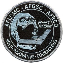 Air Force Lifecycle Management Center and Air Force Materiel Command Bombers Directorate B-21 Division
Mission: Deliver operationally effective and suitable B-21 combat capability to the nation within the cost, schedule and performance parameters codified in the Acquisition Program Baseline.
Description: The B-21 program office is comprised of professionals from the Department of the Air Force Rapid Capabilities Office and Air Force Life Cycle Management Center Bombers Directorate.  Additionally, Air Force Global Strike Command’s B-21 Integration and System Management Office is integrated into program office operations.  The program office is co-located at Joint Base Anacostia-Bolling, D.C., Wright Patterson AFB, OH, and Tinker AFB, OK, with the Program Executive Officer at the Air Force Rapid Capabilities Office.

