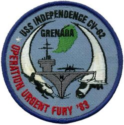 CV-62 USS Independence Operation URGENT FURY 1983
Namesake. Independence, condition of a nation in which the population exercise self-government, and sovereignty over its territory
Ordered. 2 Jul 1954
Builder. New York Navy Yard, NY
Cost. $182.3 million
Laid down. 1 Jul 1955
Launched. 6 Jun 1958
Commissioned. 10 Jan 1959
Decommissioned. 30 Sep 1998
Reclassified. CV-62, 28 Feb 1973
Stricken. 8 Mar 2004
Motto. Freedom's Flagship
Fate. Scrapped from 2017-2019
Class and type. Forrestal-class aircraft carrier
Displacement:	
60,000 long tons (61,000 t) standard
80,643 long tons (81,937 t) full load
Length. 1,070 ft (326.1 m)
Beam:	
130.0 ft (39.63 m) waterline
270 ft (82.3 m) extreme
Draft	37 ft (11.3 m)
Propulsion:	
4 Westinghouse geared turbines, four shafts, 280,000 shaft horsepower (210,000 kW)
8 Babcock & Wilcox boilers
Speed. 34 knots (63 km/h; 39 mph)
Range:	
8,000 nautical miles (15,000 km) at 20 knots (37 km/h)
4,000 nautical miles (7,400 km) at 30 knots (56 km/h)
Complement: 3,126 (ship's crew), 2,089 (air wing), 70 (flag staff), 72 (Marines)
Sensors and processing systems:	
AN/SPS-48C 3D air search radar
AN/SPS-49(V5) 2D air search radar
AN/SPS-67(V1) surface search radar
AN/SPS-64 navigation radar
Mk 91 Missile fire-control radar
Electronic warfare & decoys:	
AN/SLQ-29
Mark 36 SRBOC decoy rocket launcher
Armament:	
8 × 5"/54 caliber Mark 42 guns (127 mm)
2× 8 NATO Sea Sparrow
3× Phalanx CIWS
Aircraft carried: 70-90

