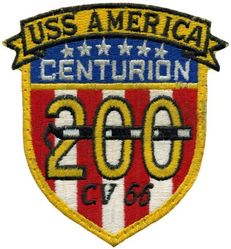 CV-66 USS America 200 Carrier Landings
Namesake. United States of America
Ordered. 25 Nov 1960
Builder. Newport News Shipbuilding, VA
Laid down. 9 Jan 1961
Launched. 1 Feb 1964
Commissioned. 23 Jan 1965
Decommissioned. 9 Aug 1996
Reclassified. CV-66, 30 Jun 1975
Stricken	.  Aug 1996
Homeport. Norfolk, VA
Motto. Don't Tread on Me
Fate. Scuttled after live-fire testing 14 May 2005
Class and type. Kitty Hawk-class aircraft carrier
Displacement. 61,174 long tons (62,156 t) (light), 83,573 long tons (84,914 t) (full load)
Length. 990 ft (300 m) (waterline), 1,048 ft (319 m) overall
Beam. 248 ft (76 m) extreme, 129 ft (39 m) waterline
Draft. 38 ft (12 m) (maximum), 37 ft (11 m) (limit)
Installed power. 280,000 hp (210 MW)
Propulsion:	
4 × steam turbines
8 × boilers
4 × shafts
Speed. 34 kn (39 mph; 63 km/h)
Complement. 502 officers, 4684 men
Sensors and processing systems:	
AN/SPS-49
AN/SPS-48
Electronic warfare & decoys. AN/SLQ-32
Armament:	
Terrier missile (replaced with Sea Sparrow)
Phalanx CIWS
Aircraft carried. 	about 79


