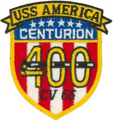 CV-66 USS America 400 Carrier Landings
Namesake. United States of America
Ordered. 25 Nov 1960
Builder. Newport News Shipbuilding, VA
Laid down. 9 Jan 1961
Launched. 1 Feb 1964
Commissioned. 23 Jan 1965
Decommissioned. 9 Aug 1996
Reclassified. CV-66, 30 Jun 1975
Stricken	.  Aug 1996
Homeport. Norfolk, VA
Motto. Don't Tread on Me
Fate. Scuttled after live-fire testing 14 May 2005
Class and type. Kitty Hawk-class aircraft carrier
Displacement. 61,174 long tons (62,156 t) (light), 83,573 long tons (84,914 t) (full load)
Length. 990 ft (300 m) (waterline), 1,048 ft (319 m) overall
Beam. 248 ft (76 m) extreme, 129 ft (39 m) waterline
Draft. 38 ft (12 m) (maximum), 37 ft (11 m) (limit)
Installed power. 280,000 hp (210 MW)
Propulsion:	
4 × steam turbines
8 × boilers
4 × shafts
Speed. 34 kn (39 mph; 63 km/h)
Complement. 502 officers, 4684 men
Sensors and processing systems:	
AN/SPS-49
AN/SPS-48
Electronic warfare & decoys. AN/SLQ-32
Armament:	
Terrier missile (replaced with Sea Sparrow)
Phalanx CIWS
Aircraft carried. 	about 79

