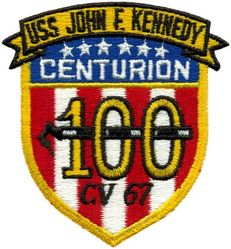 CV-67 USS John F Kennedy 100 Carrier Landings
Namesake. John F Kennedy, (1917-1963), 35th president of the USA
Awarded. 30 Apr 1964
Builder. Newport News Shipbuilding, VA
Laid down. 22 Oct 1964
Launched. 27 May 1967
Christened. 27 May 1967
Commissioned. 7 Sep 1968
Decommissioned. 23 Mar 2007
Stricken. 16 Oct 2009
Fate. Sold to International Shipbreaking Limited on 6 Oct 2021 to be dismantled 
Motto Date Nolite Rogare (Give, do not ask)
Type. variant of the Kitty Hawk class aircraft carrier
Displacement:	
60,728 tons light
82,655 tons full load
21,927 tons deadweight
Length. 1,052 ft (321 m) overall, 990 ft (300 m) waterline
Beam. 252 ft (77 m) extreme, 130 ft (40 m) waterline
Height. 192 ft (59 m) from top of the mast to the waterline
Draft. 36 ft (11 m) maximum, 37 ft (11 m) limit
Installed power. 8 × Babcock & Wilcox boilers, 1,200 PSI 280,000 shp (210 MW)
Propulsion:	
4 × steam turbines
4 shafts
Speed	34 knots (63 km/h; 39 mph)
Capacity. 5,000+
Complement. 3,297 officers and men (without jet commands & crews)
Armament:	
2 × GMLS Mk 29 launchers for Sea Sparrow missiles
2 × Phalanx CIWS
2 × RAM launchers
Aircraft carried. 	80+

