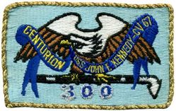 CV-67 USS John F Kennedy 300 Carrier Landings
Namesake. John F Kennedy, (1917-1963), 35th president of the USA
Awarded. 30 Apr 1964
Builder. Newport News Shipbuilding, VA
Laid down. 22 Oct 1964
Launched. 27 May 1967
Christened. 27 May 1967
Commissioned. 7 Sep 1968
Decommissioned. 23 Mar 2007
Stricken. 16 Oct 2009
Fate. Sold to International Shipbreaking Limited on 6 Oct 2021 to be dismantled 
Motto Date Nolite Rogare (Give, do not ask)
Type. variant of the Kitty Hawk class aircraft carrier
Displacement:	
60,728 tons light
82,655 tons full load
21,927 tons deadweight
Length. 1,052 ft (321 m) overall, 990 ft (300 m) waterline
Beam. 252 ft (77 m) extreme, 130 ft (40 m) waterline
Height. 192 ft (59 m) from top of the mast to the waterline
Draft. 36 ft (11 m) maximum, 37 ft (11 m) limit
Installed power. 8 × Babcock & Wilcox boilers, 1,200 PSI 280,000 shp (210 MW)
Propulsion:	
4 × steam turbines
4 shafts
Speed	34 knots (63 km/h; 39 mph)
Capacity. 5,000+
Complement. 3,297 officers and men (without jet commands & crews)
Armament:	
2 × GMLS Mk 29 launchers for Sea Sparrow missiles
2 × Phalanx CIWS
2 × RAM launchers
Aircraft carried. 	80+

