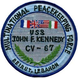 CV-67 USS John F Kennedy MULTINATIONAL PEACEKEEPING FORCE 1983
Namesake. John F Kennedy, (1917-1963), 35th president of the USA
Awarded. 30 Apr 1964
Builder. Newport News Shipbuilding, VA
Laid down. 22 Oct 1964
Launched. 27 May 1967
Christened. 27 May 1967
Commissioned. 7 Sep 1968
Decommissioned. 23 Mar 2007
Stricken. 16 Oct 2009
Fate. Sold to International Shipbreaking Limited on 6 Oct 2021 to be dismantled 
Motto Date Nolite Rogare (Give, do not ask)
Type. variant of the Kitty Hawk class aircraft carrier
Displacement:	
60,728 tons light
82,655 tons full load
21,927 tons deadweight
Length. 1,052 ft (321 m) overall, 990 ft (300 m) waterline
Beam. 252 ft (77 m) extreme, 130 ft (40 m) waterline
Height. 192 ft (59 m) from top of the mast to the waterline
Draft. 36 ft (11 m) maximum, 37 ft (11 m) limit
Installed power. 8 × Babcock & Wilcox boilers, 1,200 PSI 280,000 shp (210 MW)
Propulsion:	
4 × steam turbines
4 shafts
Speed	34 knots (63 km/h; 39 mph)
Capacity. 5,000+
Complement. 3,297 officers and men (without jet commands & crews)
Armament:	
2 × GMLS Mk 29 launchers for Sea Sparrow missiles
2 × Phalanx CIWS
2 × RAM launchers
Aircraft carried. 	80+

