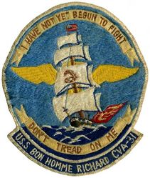 CVA-31 USS Bon Homme Richard 
Namesake. Benjamin Franklin, (1706-1790) Maximes du Bonhomme Richard, pseudonym of Benjamin Franklin
Builder. New York Naval Shipyard, NY
Laid down. 1 Feb 1943
Launched. 29 Apr 1944
Commissioned. 	26 Nov 1944
Decommissioned. 9 Jan 1947
Recommissioned. 15 Jan 1951
Decommissioned. 15 May 1953
Recommissioned. 6 Sep 1955
Decommissioned. 2 Jul 1971
Reclassified. CVA-31, 1 Oct 1952
Stricken	. 20 Sep 1989
Fate. Scrapped, 1992
Class and type. Essex-class aircraft carrier
Displacement:	
27,100 long tons (27,500 t) (standard)
36,380 long tons (36,960 t) (full load)
Length:	
820 feet (249.9 m) (wl)
872 feet (265.8 m) (o/a)
Beam. 93 ft (28.3 m)
Draft. 34 ft 2 in (10.41 m)
Installed power. 8 × Babcock & Wilcox boilers 150,000 shp (110,000 kW)
Propulsion:	
4 × geared steam turbines
4 × screw propellers
Speed. 33 knots (61 km/h; 38 mph)
Range. 14,100 nmi (26,100 km; 16,200 mi) at 20 knots (37 km/h; 23 mph)
Complement. 2,600 officers and enlisted men
Armament:	
12 × 5 in (127 mm) DP guns
32 × 40 mm (1.6 in) AA guns
46 × 20 mm (0.8 in) AA guns
Armor. Waterline belt: 2.5–4 in, Deck: 1.5 in, Hangar deck: 2.5 in, Bulkheads: 4 in 
Aircraft carried. 90

