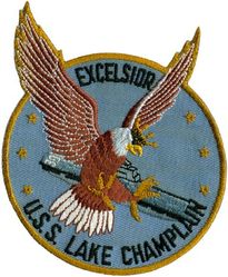CVA-39 USS Lake Champlain 
Namesake. Battle of Lake Champlain, ended the final British invasion of the northern states of the United States during the War of 1812
Builder. Norfolk Navy Yard
Laid down. 15 Mar 1943
Launched. 2 Nov 1944
Commissioned. 3 Jun 1945
Decommissioned. 17 Feb 1947
Recommissioned. 19 Sep 1952
Decommissioned. 2 May 1966
Reclassified:	
CVA-39, 1 Oct 1952
CVS-39, 1 Aug 1957
Fate. Scrapped, 28 Apr 1972
Class and type. Essex-class aircraft carrier
Displacement. 27,100 long tons (27,500 t) standard
Length. 888 feet (271 m) overall
Beam. 93 feet (28 m)
Draft. 28 feet 7 inches (8.71 m)
Installed power. 8 × boilers 150,000 shp (110 MW)
Propulsion:	
4 × geared steam turbines
4 × shafts
Speed. 33 knots (61 km/h; 38 mph)
Complement. 3448 officers and enlisted
Armament:	
12 × 5 inch (127 mm)/38 caliber guns
32 × Bofors 40 mm guns
46 × Oerlikon 20 mm cannons
Armor. Belt: 4 in (102 mm), Hangar deck: 2.5 in (64 mm), Deck: 1.5 in (38 mm), Conning tower: 1.5 inch
Aircraft carried. 90-100

