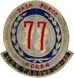 CVA-40 USS Tarawa WESTERN PACIFIC CRUISE 1953-1954
Namesake. Battle of Tarawa, was fought on 20-23 Nov 1943 at the Tarawa Atoll in the Gilbert Islands, and was part of Operation Galvanic, the U.S. invasion of the Gilberts
Builder. Norfolk Naval Shipyard, VA
Laid down. 1 Mar 1944
Launched. 12 May 1945
Commissioned. 	8 Dec 1945
Decommissioned. 30 Jun 1949
Recommissioned. 3 Feb 1951
Decommissioned. 13 May 1960
Reclassified:	
CVA-40, 1 Oct 1952
CVS-40, 10 Jan 1955
AVT-12, May 1961
Stricken. 1 Jun 1967
Fate. Scrapped, 3 Oct 1968
Class and type. Essex-class aircraft carrier
Displacement. 27,100 long tons (27,500 t) standard
Length. 888 feet (271 m) overall
Beam. 93 feet (28 m)
Draft. 28 feet 7 inches (8.71 m)
Installed power. 8 × boilers, 150,000 shp (110 MW)
Propulsion:	
4 × geared steam turbines
4 × shafts
Speed. 33 knots (61 km/h; 38 mph)
Complement. 3448 officers and enlisted
Armament:	
12 × 5 inch (127 mm)/38 caliber guns
32 × Bofors 40 mm guns
46 × Oerlikon 20 mm cannons
Armor:Belt: 4 in, Hangar deck: 2.5 in, Deck: 1.5 in, Conning tower: 1.5 inch
Aircraft carried. 90–100 aircraft

