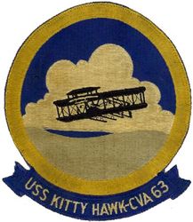 CVA-63 USS Kitty Hawk 
Namesake. Kitty Hawk, NC, where the Wright brothers made the first controlled powered airplane flight.
Awarded. 1 Oct 1955
Builder. New York Shipbuilding Corporation, Camden, NJ
Laid down. 27 Dec 1956
Launched. 21 May 1960
Commissioned. 29 Apr 1961
Decommissioned. 12 May 2009
Reclassified. CV-63, 29 Apr 1973
Stricken	. 20 Oct 2017
Homeport. Puget Sound, WA
Status. Undergoing scrapping
Class and type. Kitty Hawk-class aircraft carrier
Displacement:	
61,351 long tons (62,335 t) standard
81,985 long tons (83,301 t) full load
Length. 1,068.9 ft (325.8 m) LOA
Beam:	
282 ft (86 m) extreme
130 ft (40 m) waterline
Draft. 38 ft (12 m)
Propulsion. Westinghouse geared steam turbines, eight Foster Wheeler steam boilers, four shafts; 280,000 shp (210 MW)
Speed. 33 knots (61 km/h; 38 mph)
Complement. 5,624 officers and men
Armament. RIM-7 Sea Sparrow surface-to-air missiles, 2 RIM-116 RAM, 2 Phalanx CIWS Automated Anti-Missile/Aircraft Defenses
Aircraft carried. 85
Typical 2000 air wing (70 aircraft):
40 F/A 18E/F Super hornet fighter-bombers
4 EA-6B Prowler combat EW
4 E-2C Hawkeye AEW
5 SH-60F/HH-60H Sea Hawk helicopters
1 C-2A Greyhound carrier on-board delivery

