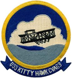 CVA-63 USS Kitty Hawk 
Namesake. Kitty Hawk, NC, where the Wright brothers made the first controlled powered airplane flight.
Awarded. 1 Oct 1955
Builder. New York Shipbuilding Corporation, Camden, NJ
Laid down. 27 Dec 1956
Launched. 21 May 1960
Commissioned. 29 Apr 1961
Decommissioned. 12 May 2009
Reclassified. CV-63, 29 Apr 1973
Stricken	. 20 Oct 2017
Homeport. Puget Sound, WA
Status. Undergoing scrapping
Class and type. Kitty Hawk-class aircraft carrier
Displacement:	
61,351 long tons (62,335 t) standard
81,985 long tons (83,301 t) full load
Length. 1,068.9 ft (325.8 m) LOA
Beam:	
282 ft (86 m) extreme
130 ft (40 m) waterline
Draft. 38 ft (12 m)
Propulsion. Westinghouse geared steam turbines, eight Foster Wheeler steam boilers, four shafts; 280,000 shp (210 MW)
Speed. 33 knots (61 km/h; 38 mph)
Complement. 5,624 officers and men
Armament. RIM-7 Sea Sparrow surface-to-air missiles, 2 RIM-116 RAM, 2 Phalanx CIWS Automated Anti-Missile/Aircraft Defenses
Aircraft carried. 85
Typical 2000 air wing (70 aircraft):
40 F/A 18E/F Super hornet fighter-bombers
4 EA-6B Prowler combat EW
4 E-2C Hawkeye AEW
5 SH-60F/HH-60H Sea Hawk helicopters
1 C-2A Greyhound carrier on-board delivery

