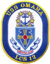 LCS-12-USS Omaha
Namesake. City of Omaha, NE
Awarded. 29 Dec 2010
Builder. Austal USA, Mobile, AL
Laid down. 18 Feb 2015
Launched. 20 Nov 2015
Christened. 19 Dec 2015
Acquired. 15 Sep 2017
Commissioned. 3 Feb 2018
Homeport. NB San Diego, CA
Motto. Fortiter In Re (Resolute In Deed)
Status. In Active service
Class and type. Independence-class littoral combat ship
Displacement:	
2,307 t (2,271 long tons) light
3,104 t (3,055 long tons) full
797 t (784 long tons) deadweight
Length. 127.4 m (418 ft)
Beam. 31.6 m (104 ft)
Draft. 4.3 m (14 ft)
Propulsion. 2 × gas turbines, 2 × diesel, 4 × waterjets, retractable Azimuth thruster, 4 × diesel generators
Speed. +40 knots (74 km/h; 46 mph), 47 knots (87 km/h; 54 mph) sprint
Range. 4,300 nmi (8,000 km; 4,900 mi) at 20 knots (37 km/h; 23 mph)+
Capacity. 210 t (210 long tons; 230 short tons)
Complement. 40 core crew (8 officers, 32 enlisted) plus up to 35 mission crew
Sensors and processing systems:	
Sea Giraffe 3D Surface/Air RADAR
Bridgemaster-E Navigational RADAR
AN/KAX-2 EO/IR sensor for GFC
Electronic warfare & decoys:	
EDO ES-3601 ESM
4 × SRBOC rapid bloom chaff launchers
Armament:	
BAE Systems Mk 110 57 mm (2.2 in) gun
4 × .50 cal (12.7 mm) guns (2 aft, 2 forward)
Evolved SeaRAM 11 cell missile launcher
Mission modules
Aircraft carried. 	2 × MH-60R/S Seahawks

