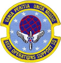 452d Operations Support Squadron
Translation: VARIO PERTIA UNITA MISSIO = Varied in Expertise United in Mission
