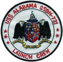 SSBN-731 USS Alabama Launch Crew
Namesake. State of Alabama
Ordered. 27 Feb 1978
Builder. General Dynamics Electric Boat, Groton, Connecticut
Laid down. 14 Oct 1980
Launched. 19 May 1984
Commissioned. 25 May 1985
Homeport. Bangor, WA
Motto: Audemus Jura Nostra Defendere ("We dare defend our rights")
Status. in active service
Class and type. Ohio-class ballistic missile submarine
Displacement.	
16,764 long tons (17,033 t) surfaced
18,750 long tons (19,050 t) submerged
Length. 560 ft (170 m)
Beam. 42 ft (13 m)
Draft. 38 ft (12 m)
Propulsion.	
1 × S8G PWR nuclear reactor[1] (HEU 93.5%)
2 × geared turbines
1 × 325 hp (242 kW) auxiliary motor
1 × shaft @ 60,000 shp (45,000 kW)
Speed. Greater than 25 knots (46 km/h; 29 mph)
Test depth. Greater than 800 feet (240 m)
Complement. 15 officers, 140 enlisted
Armament.	
MK-48 torpedoes
20 × Trident II D-5 ballistic missiles

