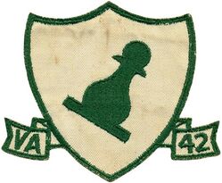 Attack Squadron 42 (VA-42)
Established as Fighter Squadron FORTY TWO (VF-42) on 1 Sep 1950. Redesignated Attack Squadron FORTY TWO (VA-42) "Green Pawns" on 1 Nov 1953. Disestablished on 30 Sep 1994. The first squadron to be assigned the VA-42 designation.

Douglas AD-4/4L/6/4N Skyraider, 1953-1963

The insignia for VA-42, the green pawn, was originally approved by CNO for Bombing and Fighting Squadron 75 (VBF-75) on 28 Oct 1946. When VBF-75 was redesignated VF-4B on 15 Nov 1946, the insignia was carried over for use by Fighting Squadron 4B (VF-4B). On 1 Sep 1948 VF-4B was redesignated Fighting Squadron 42 (VF-42). This squadron continued to use the green pawn insignia until it was disestablished on 8 Jun 1950. When a new Fighting Squadron 42 (VF-42) was established on 1 Sep 1950 they adopted the green pawn insignia that had been used by the former VF-42. In 1953 the insignia was carried over to VA-42 following its redesignation from VF-42.

