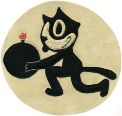 Fighter Squadron 3 (VF-3)
Established as Combat Squadron Four prior to 1 Jan 1922. Redesignated Fighter Squadron TWO (VF-2) (1st VF-2) on 1 Jul 1922; Fighter Squadron TWO B (VF-2B) (1st VF-2B) on 19 Mar 1923; Fighter Squadron SIX B (VF-6B) (1st VF-6B) on 1 Jan 1927; Bombing Squadron TWO B (VB-2B) on 1 Jul 1928; Fighter Squadron SIX B (VF-6B) (3rd VF-6B) on 1 Jul 1930; Fighter Squadron THREE (VF-3) (2nd VF-3) on 1 Jul 1937; Fighter Squadron SIX (VF-6) on 15 Jul 1943. Disestablished on 1 Oct 1945.

Insignia adopted in 1928 as VB-2B. US made, schiffli embroidery on wool
Fighter Squadron SIX (VF-6) was operating with Air Group THREE (CVG-3) and Fighter Squadron THREE (VF-3) was operating with Air Group SIX (CVG 6), the names of the two squadrons were officially  altered and VF-6 became VF-3 and VF-3 became VF-6 on 15 Jul 1943. Because the squadron number was officially changed from VF-6 to VF-3 the squadron discarded the VF-6 insignia of the shooting star and assumed the official insignia of VF-3 which was Felix the Cat. 

VF-3
15 Mar 1938-Apr 1938, CV-3 USS Saratoga, Saratoga Air Group, Grumman F3F-1, Vought O3U-3 Corsair
20 Apr 1939, CV-2 USS Lexington, Lexington Air Group, Grumman F3F-1, Great Lakes BG-1
2 Apr 1940-21 Jun 1940, CV-3 USS Saratoga, Saratoga Air Group, Brewster F2A-1 Buffalo, Grumman F3F-1	
8 Dec 1941-19 Feb 1942, CV-3 USS Saratoga, Saratoga Air Group, Grumman F4F-3A Wildcat	
11 Jan 1942-26 Mar 1942, CV-2 USS Lexington, Lexington Air Group, Grumman F4F-3A Wildcat
30 May 1942-7 Jun 1942, CV-5 USS Yorktown, Yorktown Air Group, Grumman F4F-4 Wildcat
Aug 1942-Sep 1942, Guadalcanal/Solomons, Grumman F4F-4 Wildcat

