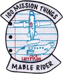 586th Flight Test Squadron C-12J Morale
Normally a "people mover," this C-12J, nicknamed "Ms. Mable," is an Air Force version of a Beech 1900C airliner that has been highly modified to support agile, low-cost testing of advanced avionics and weapons. Perhaps the most unusual modification is the addition of two pylons and bomb racks that enable the aircraft to carry test items, like the Laser Maverick, on the belly of its fuselage.
