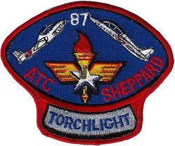 80th Flying Training Wing Torchlight Competition 1987
Torchlight was a 5-day flying and maintenance competition sponsored by HQ ATC and hosted by the 12th Flying Training Wing. The competition was intended to test various phases of instructor pilot proficiency and maintenance capability, and to recognize the best aircrews and maintenance teams in the command.  
