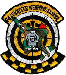 USAF Fighter Weapons School F-4 
Use of specific aircraft Divisions did not start until 1981. This design predates that, though it may have been used early in the Division era. Philippine made.
