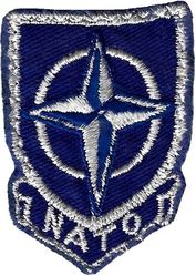 Tactical Air Command/North Atlantic Treaty Organization 
Worn by units with a dual TAC/NATO commitment. The 4 TFW, 49 TFW and 67 TRW are examples. This one was used by a 67 TRW/417 TFS pilot circa 1969. German made.
