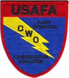 United States Air Force Academy Flight Operations Standardization/Evaluation
CWO= Chief of Warfighter Development/Operations. This role ensures aircrews are competent, managing training, evaluations, and adherence to flight procedures for both regular operations and test flights. 

