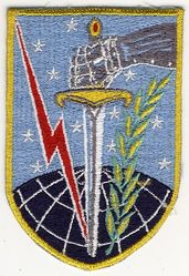 12th Bombardment Squadron, Medium
Emblem Significance: Our emblem symbolizes our Squadron's mission and our relationship to the Strategic Air Command. A mailed fist holding a downward pointed broadsword symbolizes the force and preparedness of a unit possessing striking power. The mailed fist and lightning bolt as well as the olive branch are from the emblem of the Strategic Air Command and signify power and striking potential while maintaining the peace. The element of the grid-lined globe notes the world-wide capability of the unit while the upper portion of the field of the shield contains the star-encrusted blue of the SAC banner. Emblem approved 5 August 1957. (Source: AFHRA Records) 

