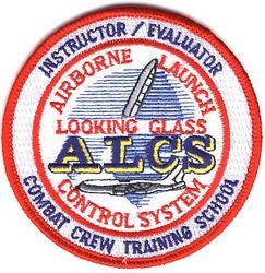 7th Airborne Command and Control Squadron Airborne Launch Control System Combat Crew Training School Instructor/Evaluator
This patch was created in January 1994 by Maj Greg Ogletree to replace the ORT Instructor version because ALCS ORT became the ALCS Combat Crew Training School at that time. Nevertheless, I've labeled this a 7 ACCS patch because 6 months later the 2 ACCS was replaced by the 7 ACCS and the CCTS continued, as such until April 1996. Because the CCTS was a formal Air Force school, the Commander of the 7 ACCS was its Commandant (even though he was in ACC and the school's faculty were all in AFSPC). All CCTS faculty were both instructor and evaluator certified. They trained and evaluated the joint staff in USSTRATCOM who operated the weapon system. 

