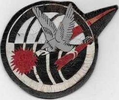 323d Fighter-Interceptor Squadron 
First patch for the new unit. When the Dog was grounded the pilots had almost nothing to do. The Dog was grounded due to fleet-wide fuel control problems with the early F-86Ds. Elk skin was used to fabricate a few patches by hand according to Col. Byrnes, USAF Ret. The elk skin hand-painted patches were used while the unit awaited the arrival of the cloth examples. At the time, the unit only had a few assigned pilots and airplanes. 
Keywords: F-86D