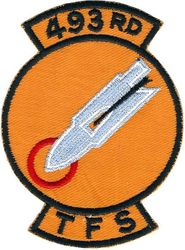 493d Tactical Fighter Squadron 
Dark yellow with light blue bomb, UK made.
