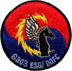 6903d Electronic Security Group Director of Operations
DO is Director of Operations, FC is most likely an office under the DO. Korean made.
