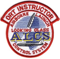 2d Airborne Command and Control Squadron Operational Readiness Training School Instructor
Created by Maj Greg Ogletree in early 1993 for wear by the ACC members comprising the faculty of the Air Force's Operational Readiness Training (ORT) School. ("ORT"--a term that had been used by ALCS since the late 1960s--would soon be replaced by the more familiar "CCTS.") 
