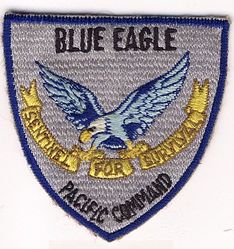 United States Pacific Command Airborne Command Post BLUE EAGLE
"Blue Eagle" was the nickname of the US Pacific Command Airborne Command Post (ABNCP), and "Sentinel For Survival" was its motto.
I believe the brown motto on the scroll is the earliest version. 
